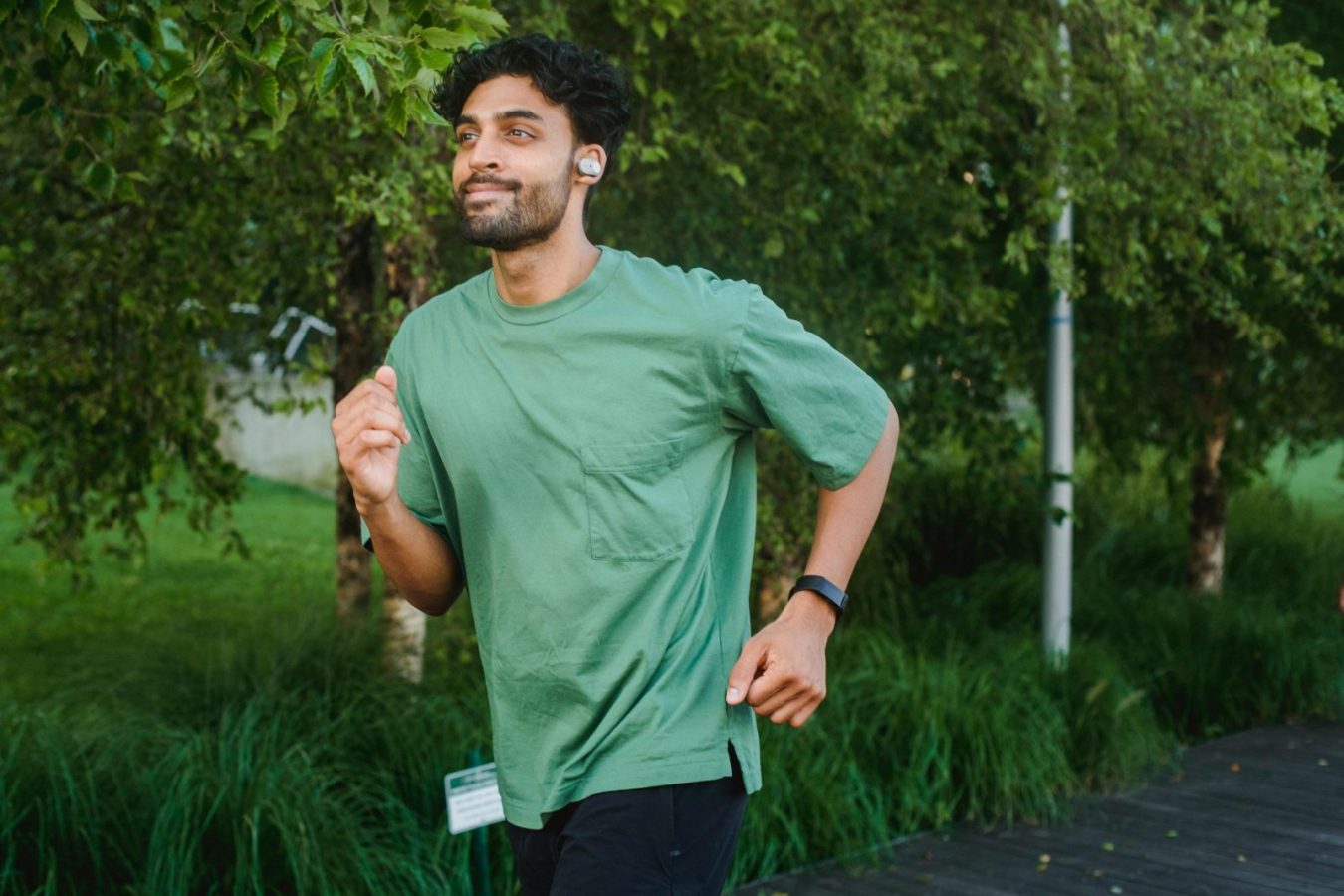 why do my lower legs hurt when I walk - person touching calf muscle during walk