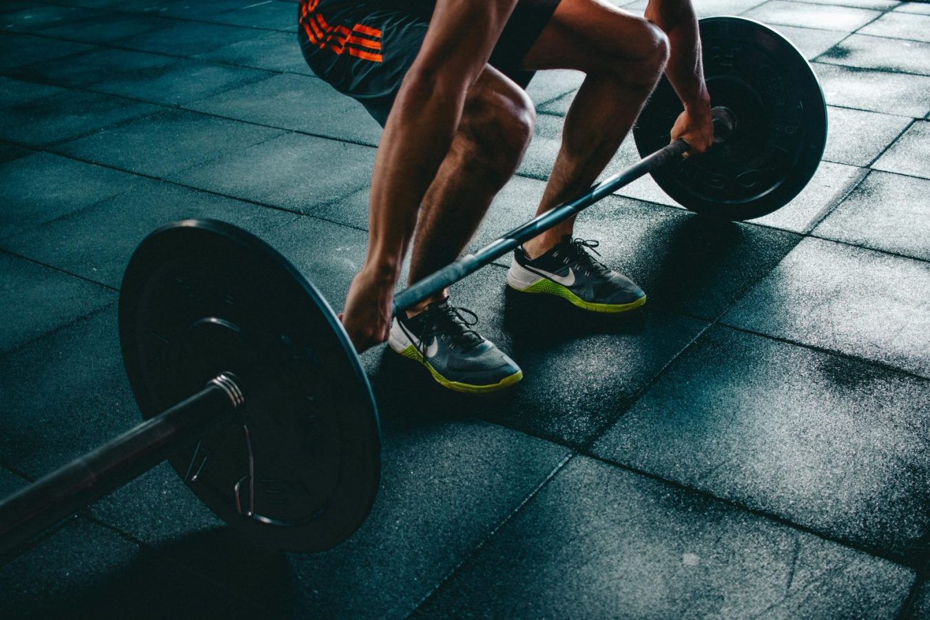 why do muscles hurt after working out - overtraining exhaustion in gym