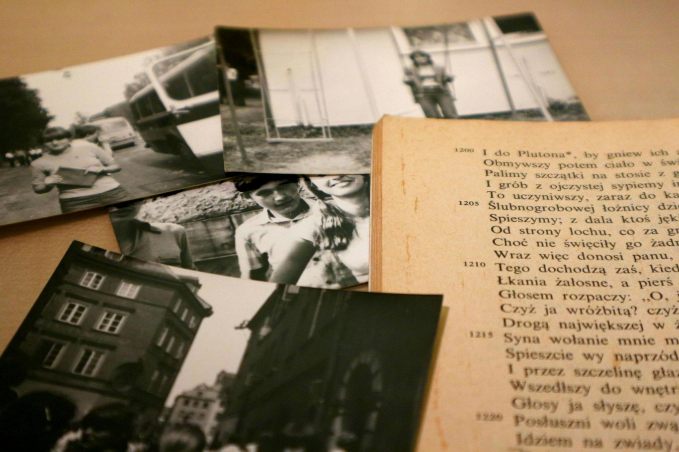vintage photographs spread on a wooden table