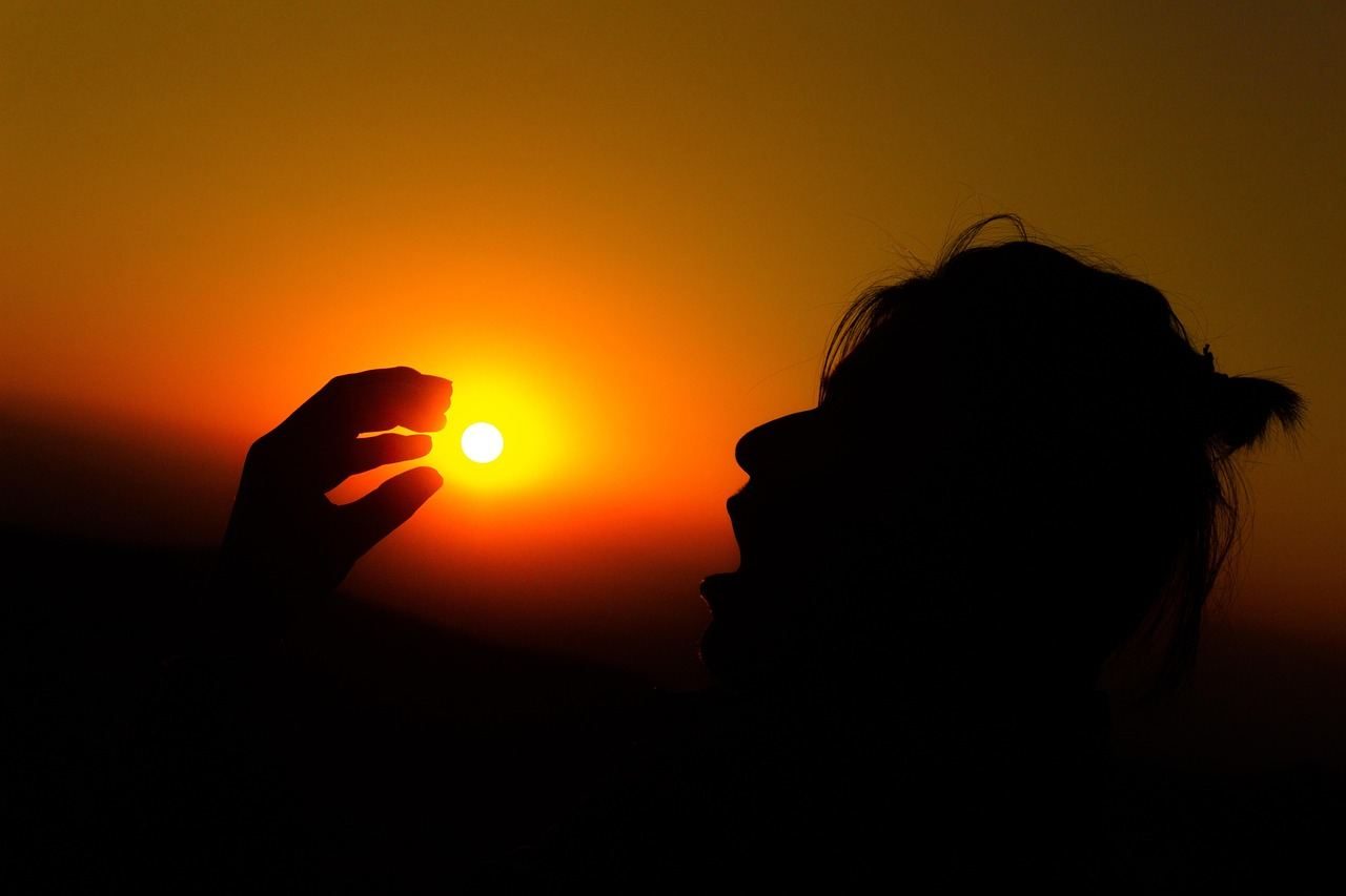 silhouette at sunset letting go of the past