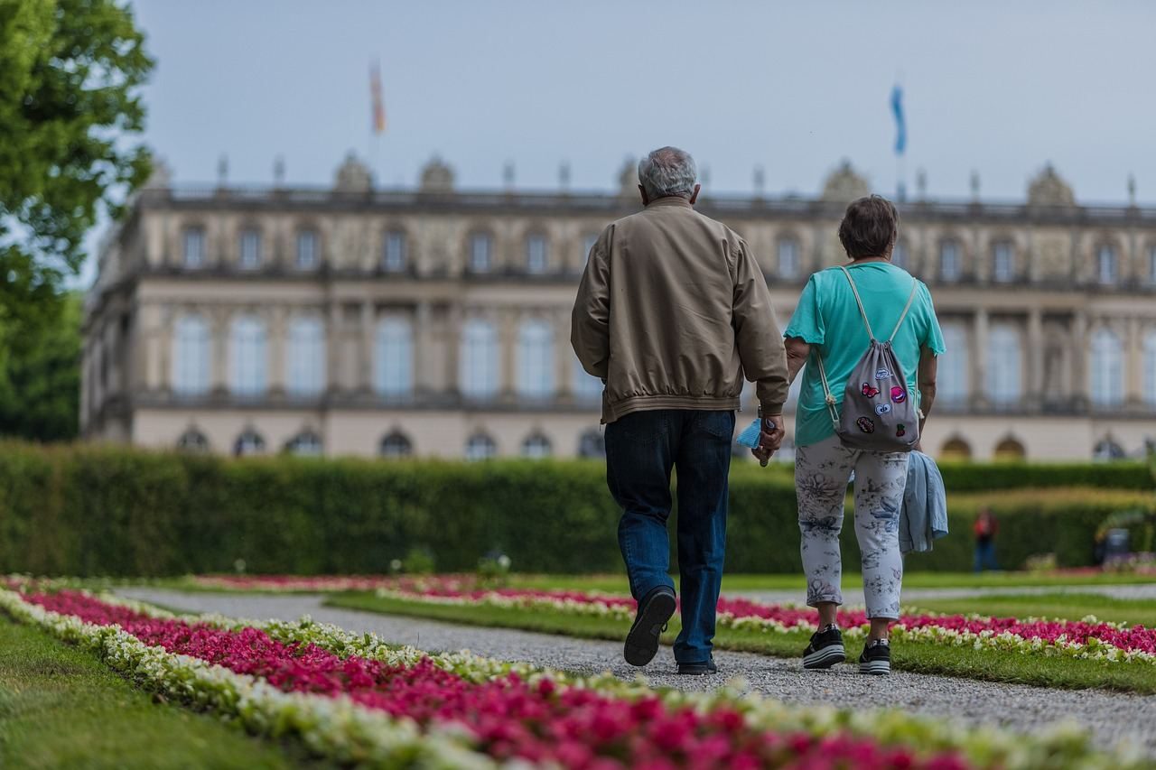 Middle-aged couple walking together while traveling