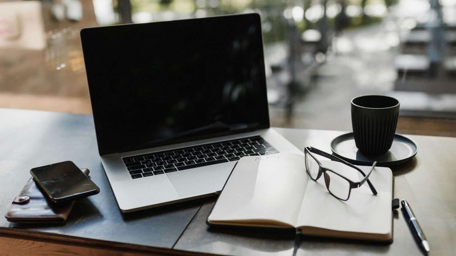calm workspace with laptop and coffee