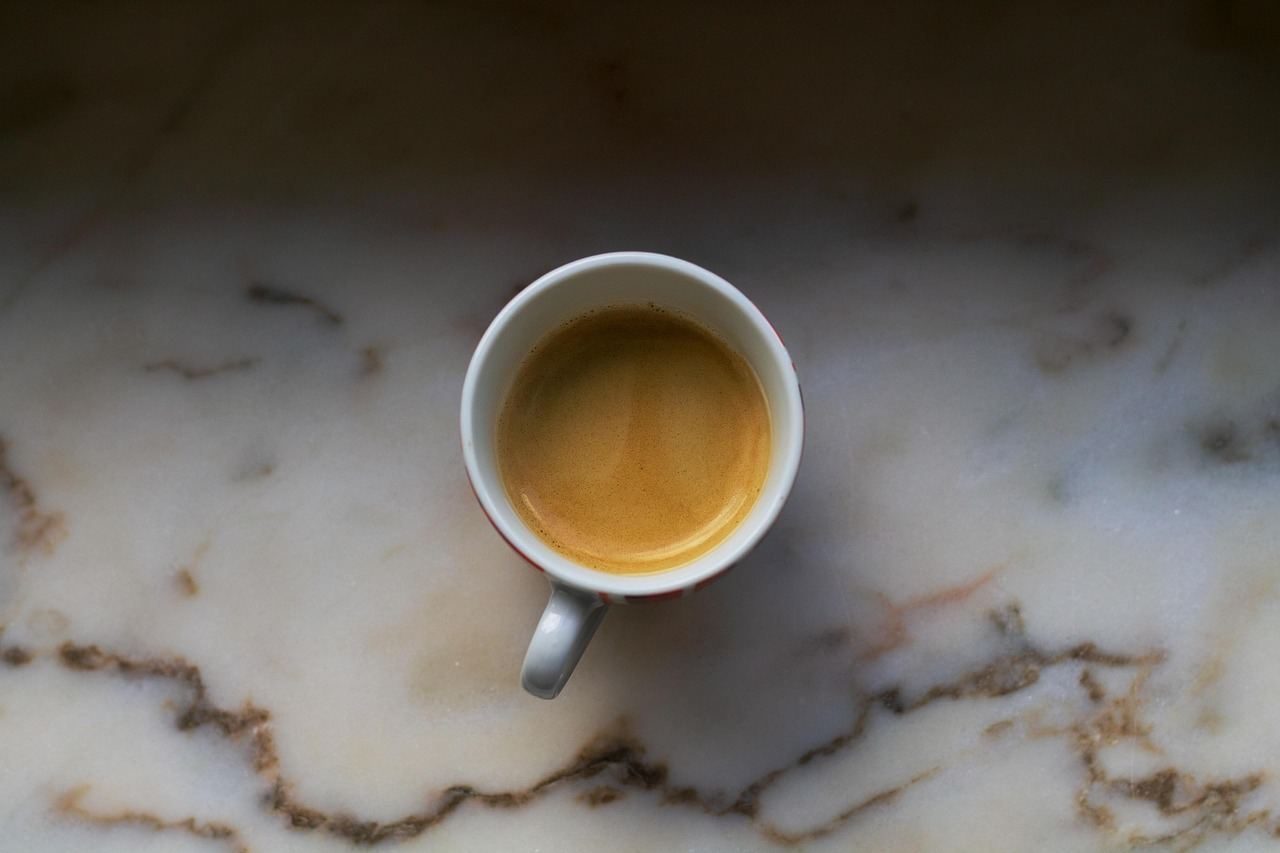 cup of coffee on a stone surface